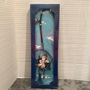 Skullpanda Exclusive Mirage Phone Chain from Pop Mart with Blue and Red Beads